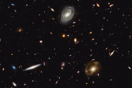 An infrared image showing many galaxies filling the frame