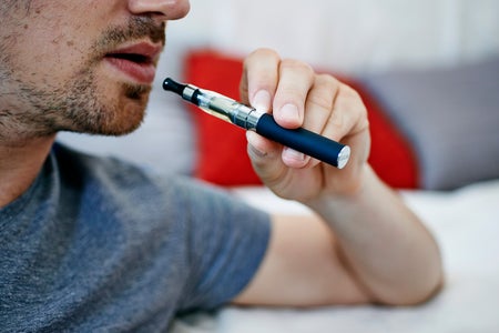 man smoking e-cigarette